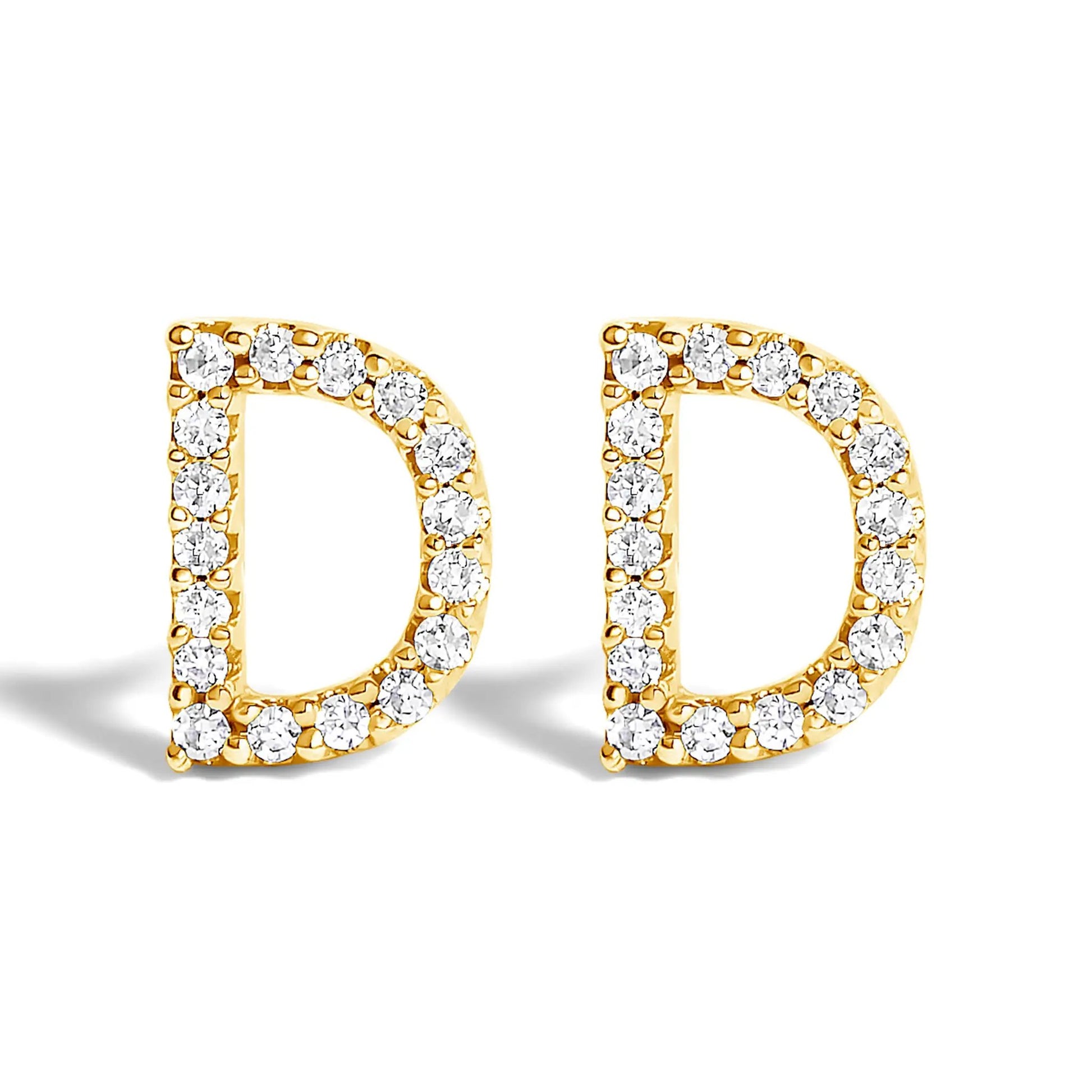 Gold hoop earrings adorned with pavé diamonds along the outer edge on Tampa Home & Garden Store