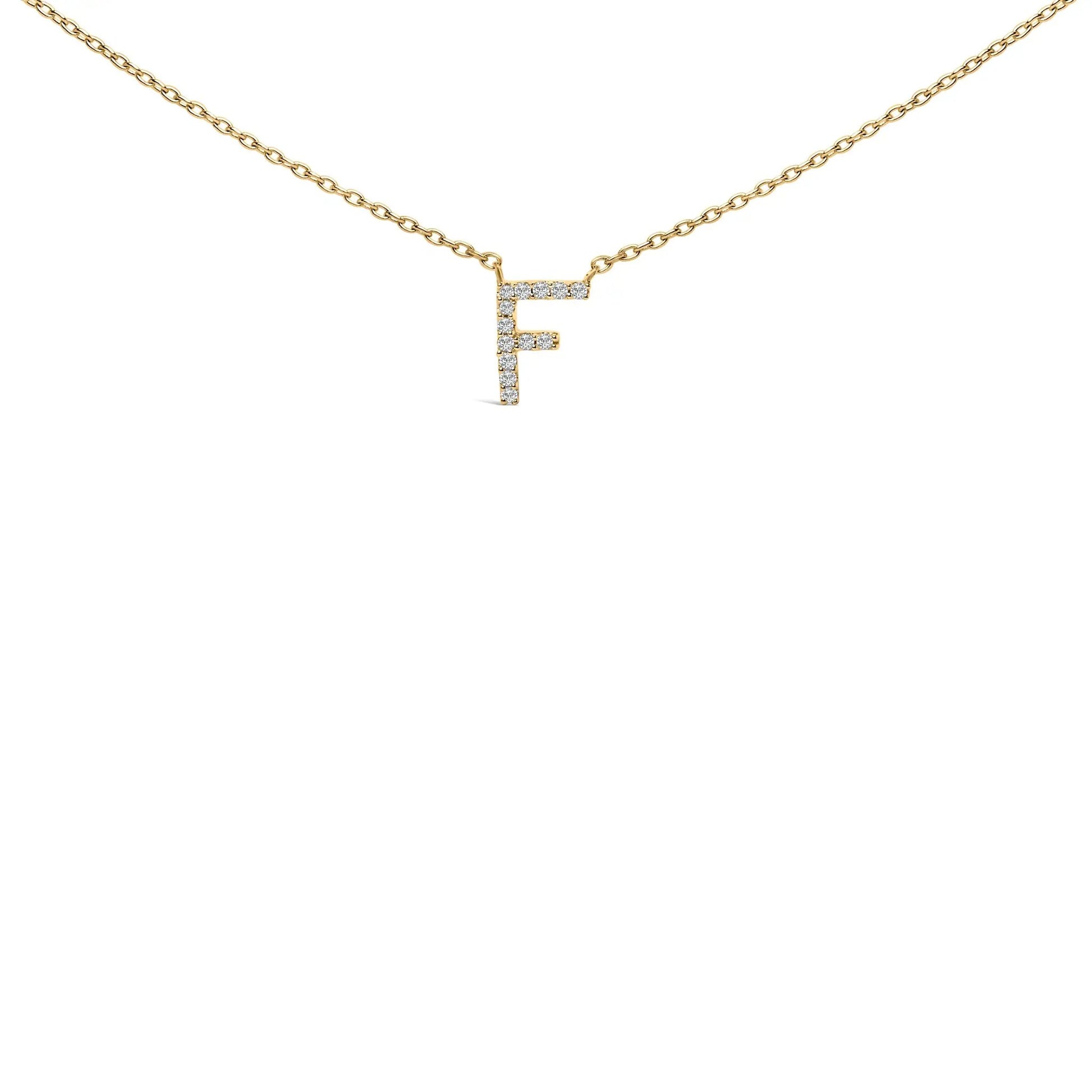 Yellow gold necklace with diamond-accent initial pendant on Tampa Home & Garden Store