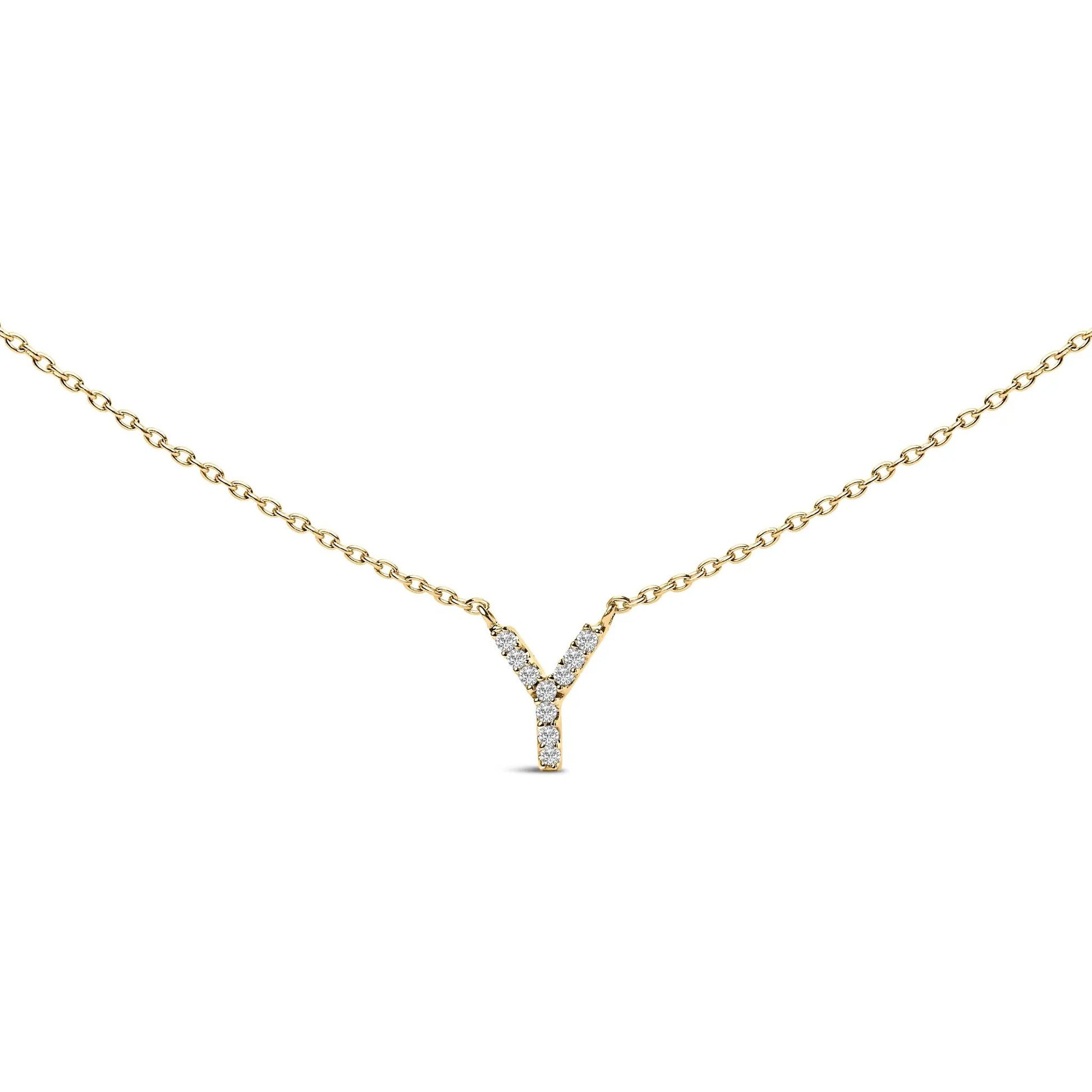 An initial pendant necklace with diamond accents in 10K white gold on a slim chain on Tampa Home & Garden Store