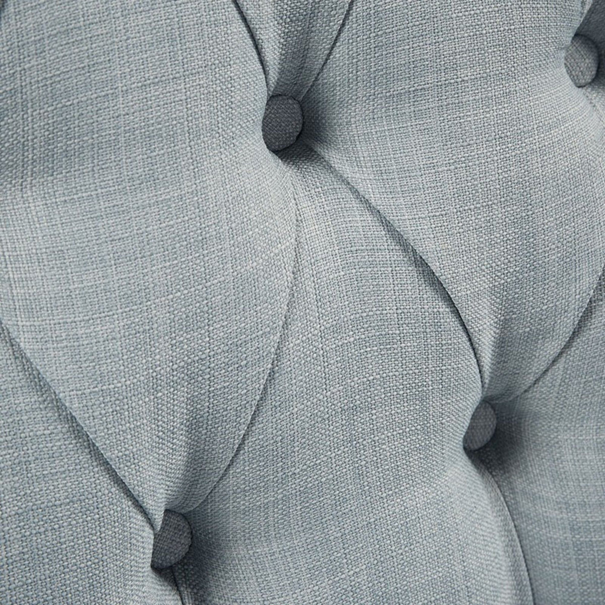 Button tufted accent arm chair in light blue-gray textured fabric with removable cushion on Tampa Home & Garden Store