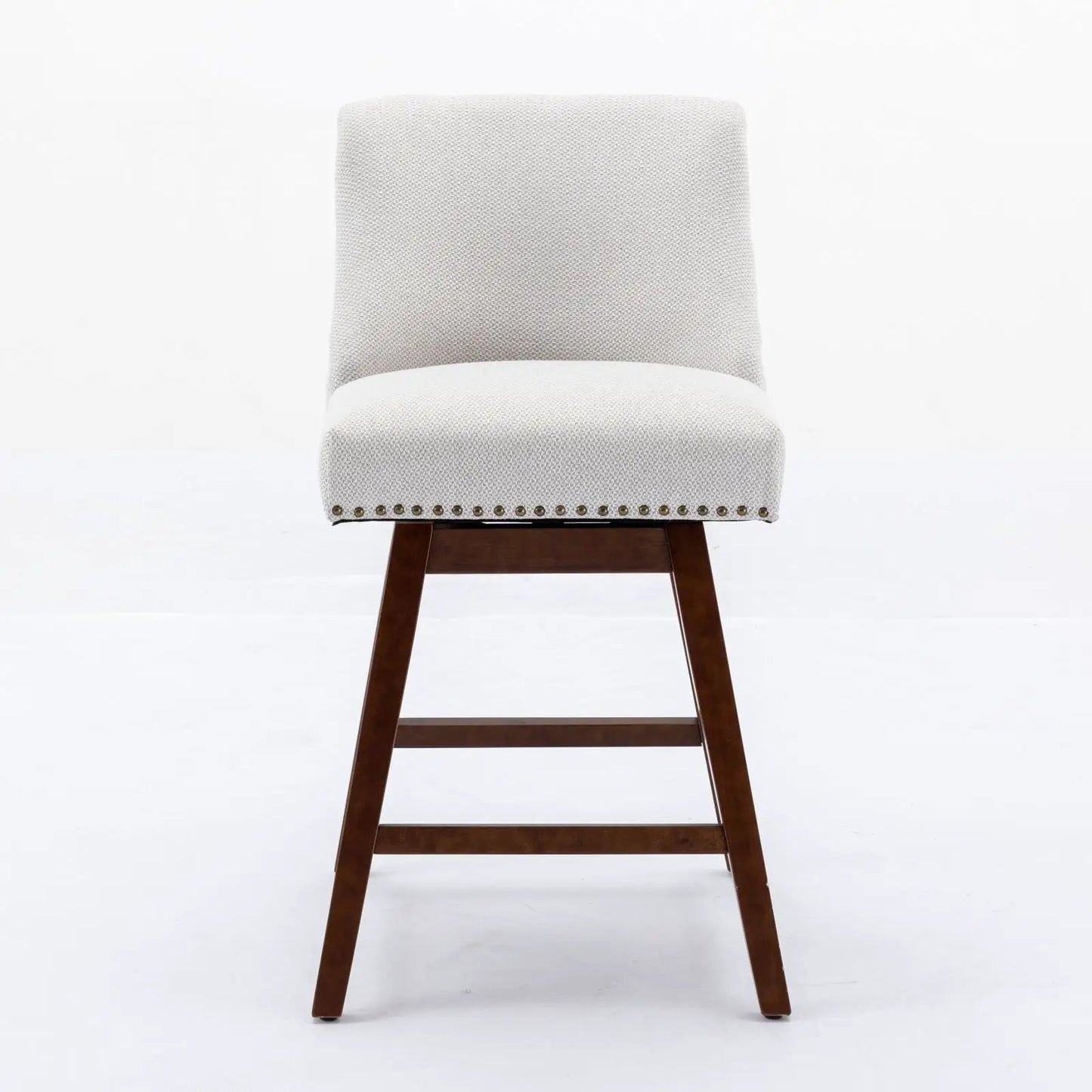 Counter height swivel barstool in gray fabric with nailhead trim and dark wood legs on Tampa Home & Garden Store