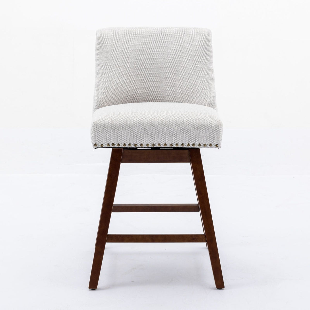 Counter height swivel barstool in light gray fabric with nailhead trim and dark wood legs on Tampa Home & Garden Store