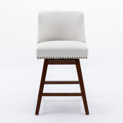 Counter height swivel barstool in light gray fabric with nailhead trim and dark wood legs on Tampa Home & Garden Store