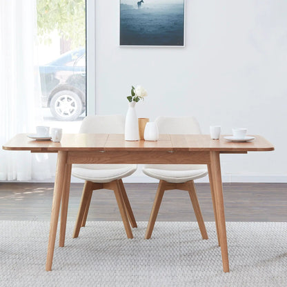 Round-corner wooden dining table with diagonal legs and telescopic extension for 6–8 people on Tampa Home & Garden Store