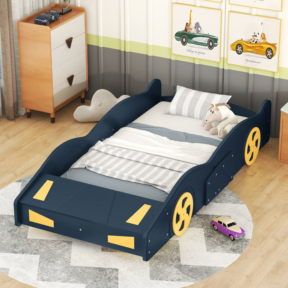 Race car shaped platform bed with wheels in navy blue and yellow accents, storage drawers on Tampa Home & Garden Store