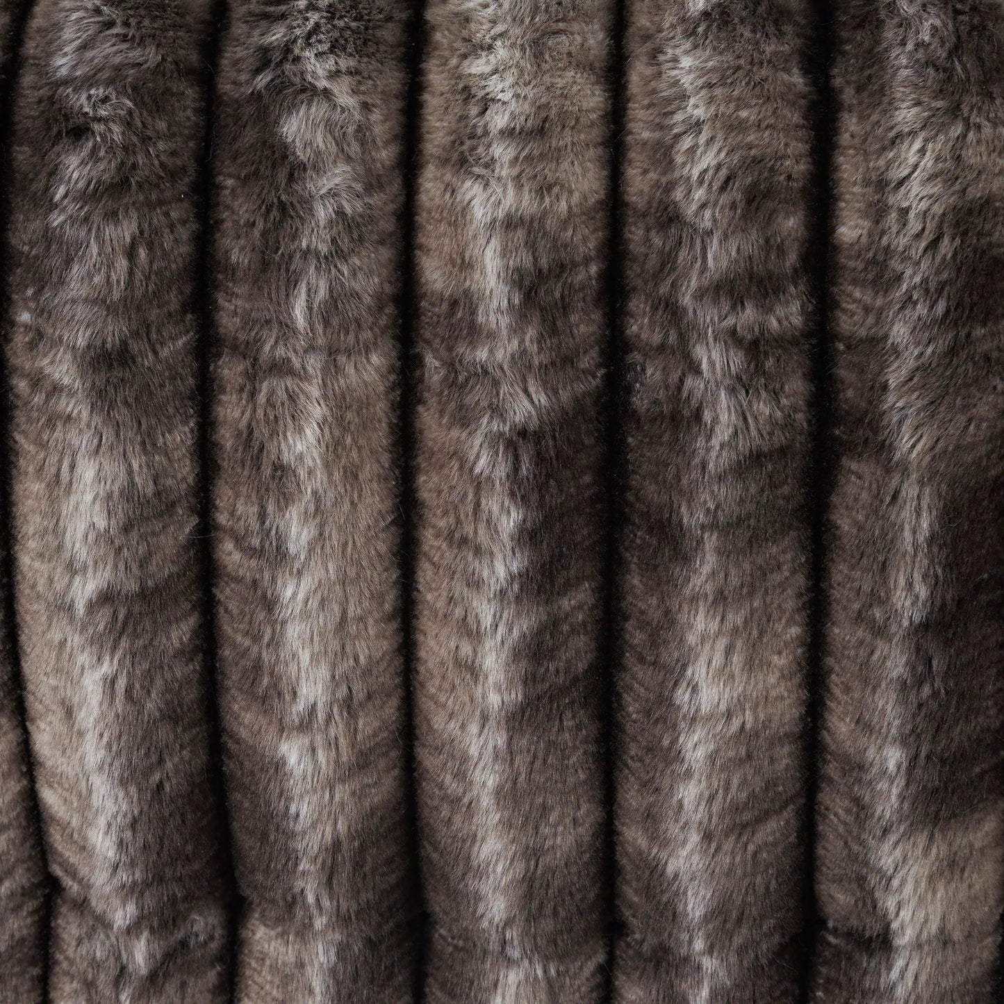 Brown faux fur upholstery swatch for glider chairs by Unique Piece Furniture on Tampa Home & Garden Store