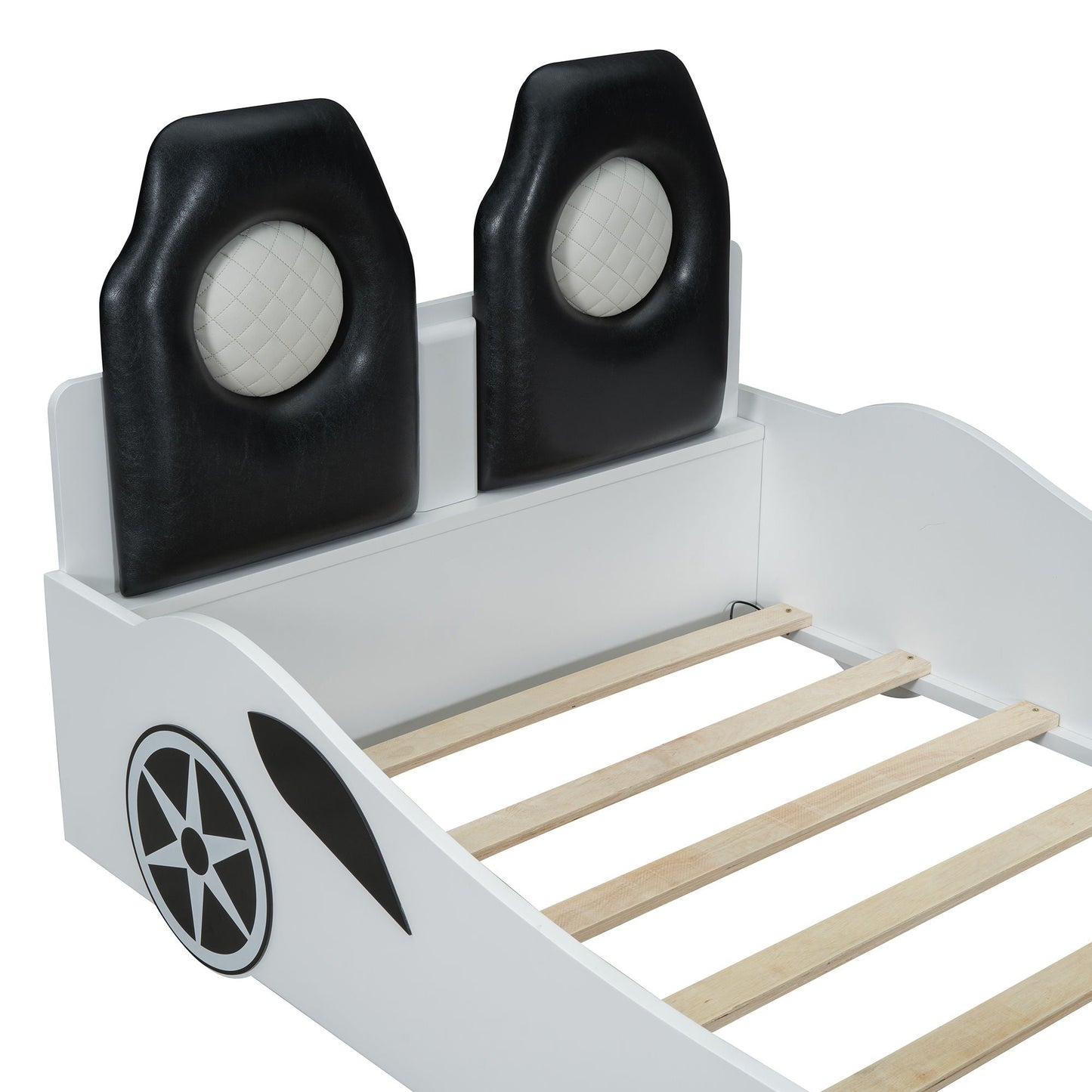 Race car shaped platform bed with LED, white frame and two black upholstered backrests on Tampa Home & Garden Store