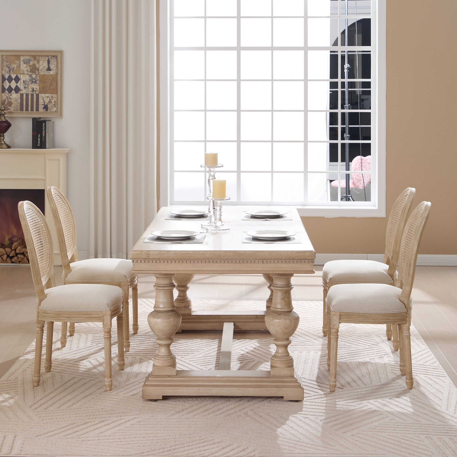 French Country dining chairs with beige upholstered seats and rattan backs around a wooden table on Tampa Home & Garden Store
