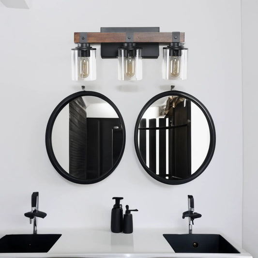 Walnut farmhouse vanity three-light wall fixture with clear glass shades and black metal mounts on Tampa Home & Garden Store