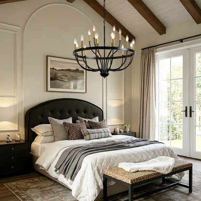 18-Light Industrial Iron Candle Chandelier in black iron with brass candle holders above a bed on Tampa Home & Garden Store