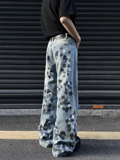 Slightly Flared Wide Leg Jeans FLIPSTYLEZLLC, light denim with black paint-splatter pattern on Tampa Home & Garden Store