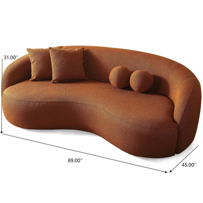 Drake Japandi Style Curvy Boucle Sofa rust orange with two square and two cylindrical cushions on Tampa Home & Garden Store