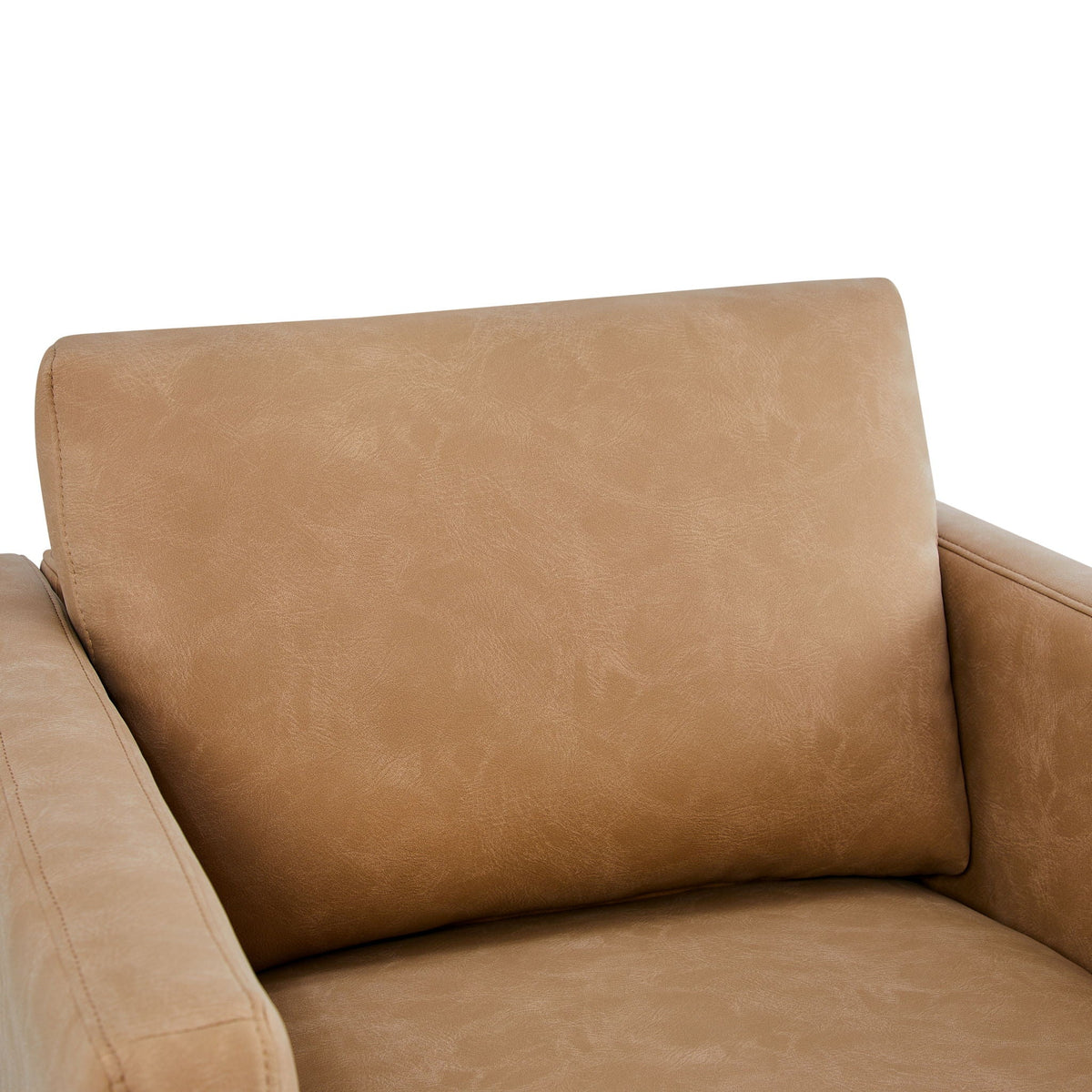 Tulo Arm Chair cushion in tan leather with visible stitching on Tampa Home & Garden Store