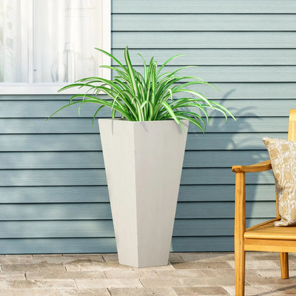 Outdoor Modern Cast Stone Planter in light gray with tapered silhouette and green plant on Tampa Home & Garden Store