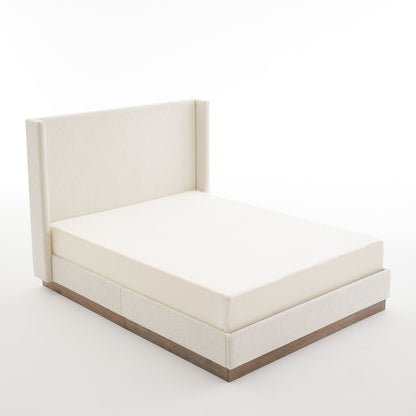 Hosford upholstered wingback bed with wood base platform in cream fabric, partial headboard on Tampa Home & Garden Store