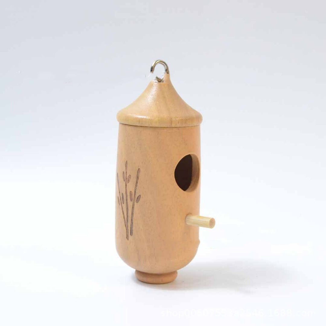 Wooden hummingbird nest birdhouse with natural wood finish and hanging loop on Tampa Home & Garden Store