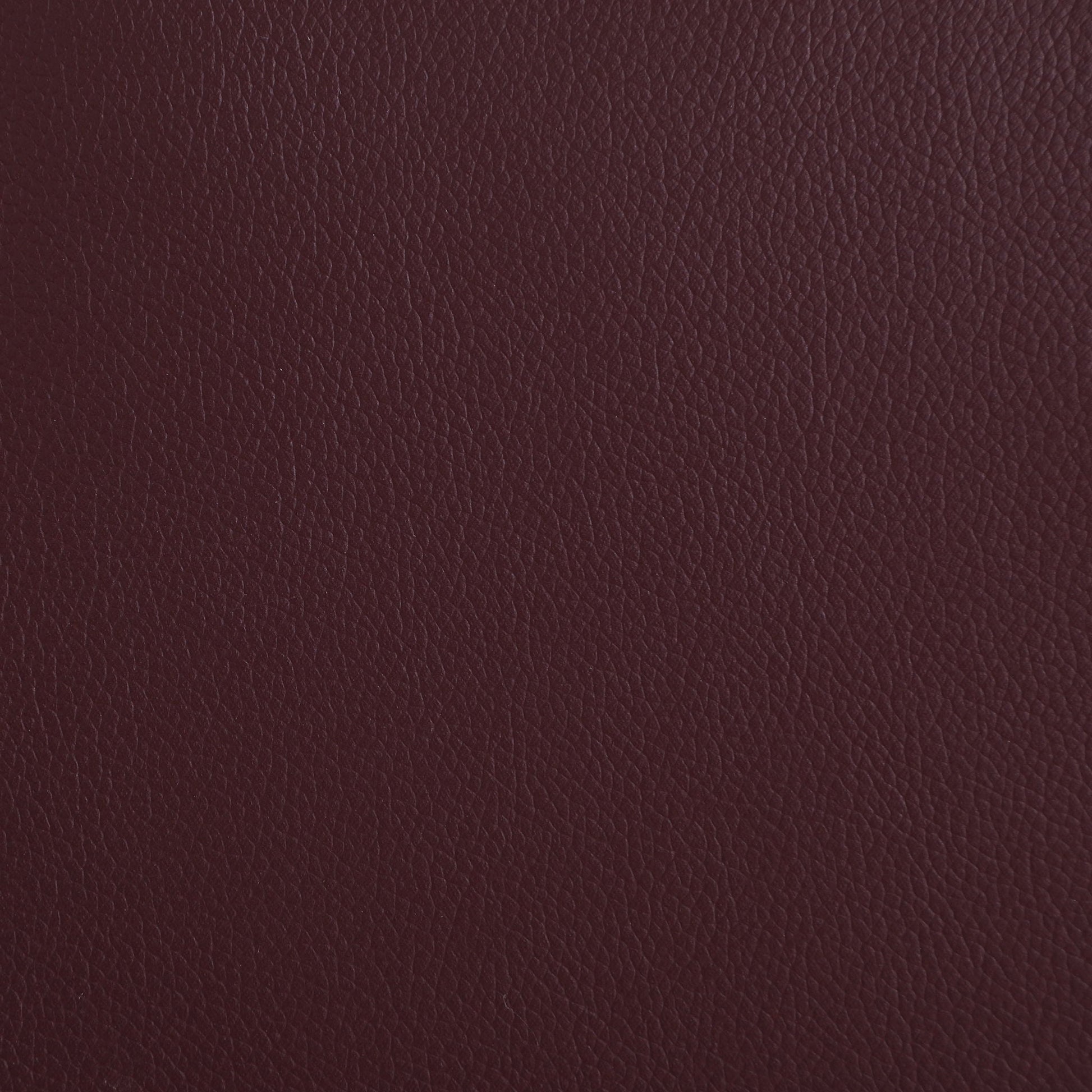 Macklin massage recliner burgundy leather upholstery texture close-up on Tampa Home & Garden Store