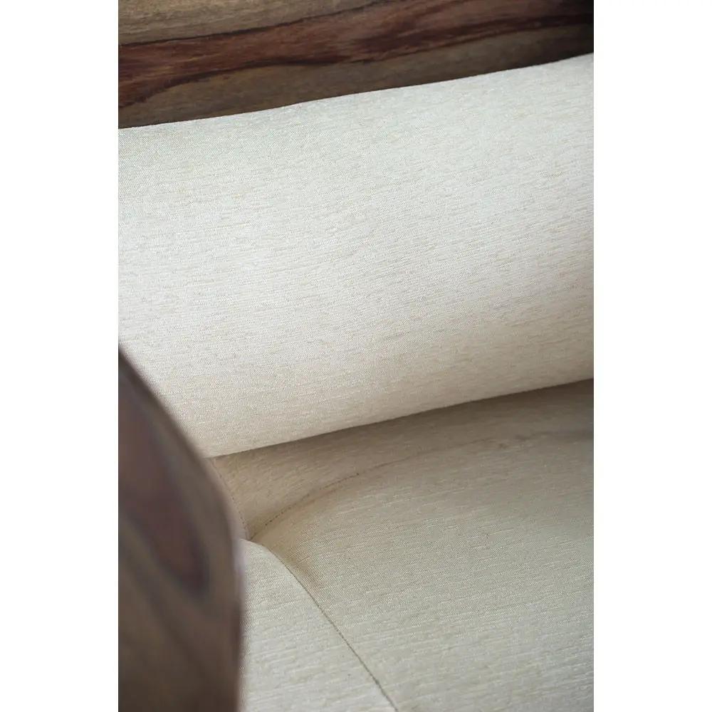 Wooden sofa with brown wood arm and beige fabric upholstery on Tampa Home & Garden Store