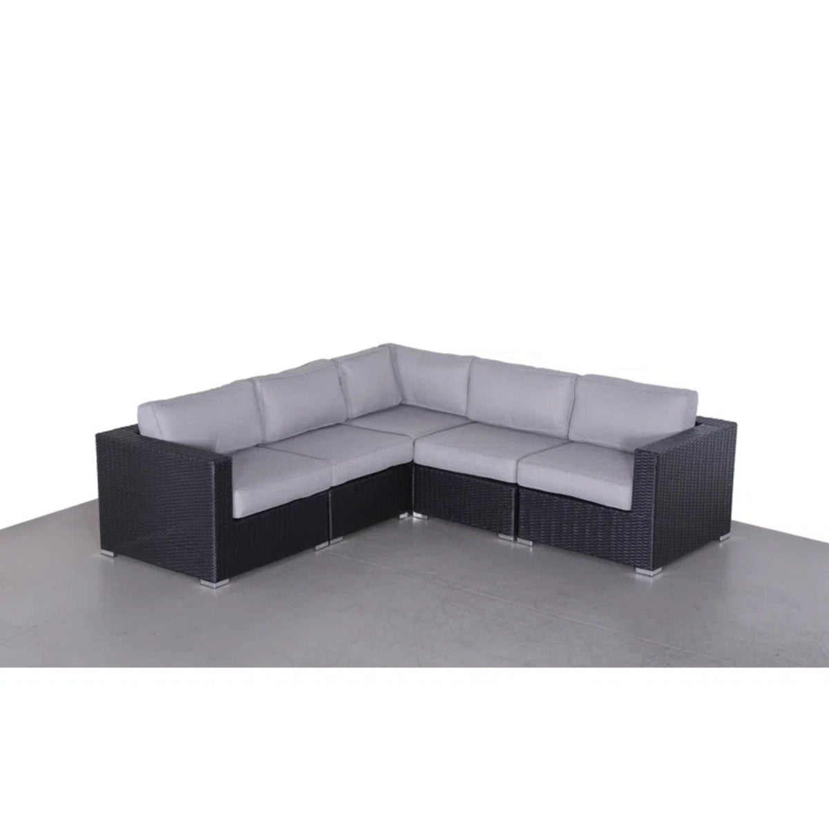 Luxurious wicker L-shaped stationary sectional by HouseOfZazla with light gray Sunbrella cushions on Tampa Home & Garden Store