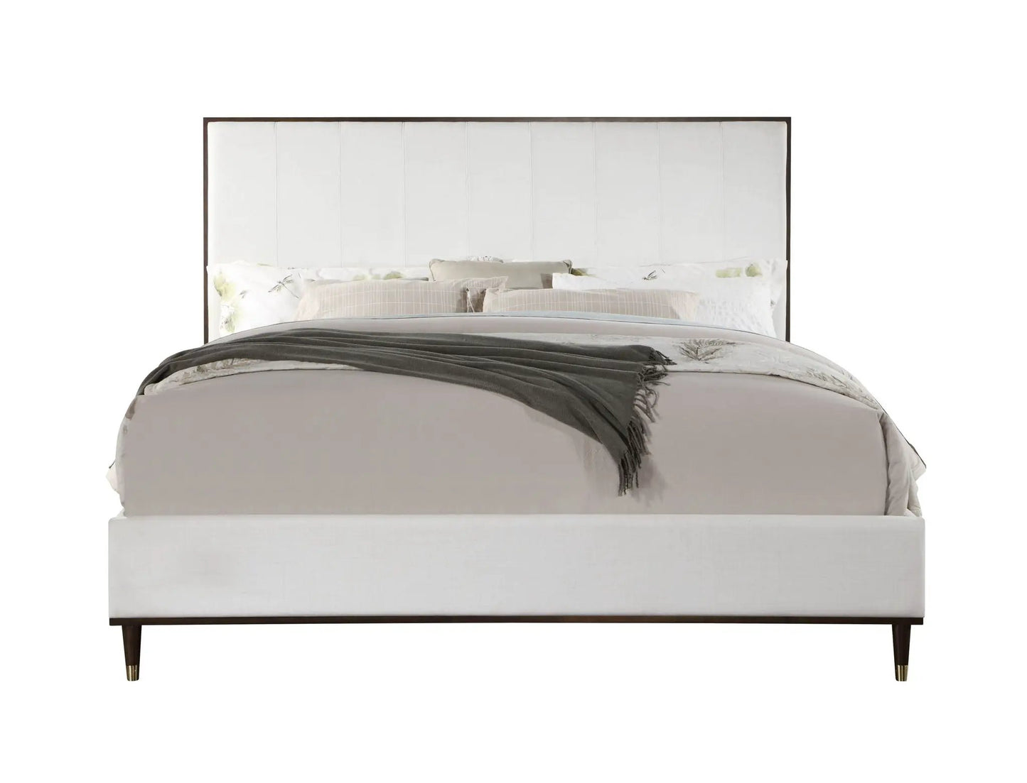 Carena Comfort Bed upholstered bed in light cream fabric with dark wood frame and tapered legs, neutral bedding on Tampa Home & Garden Store