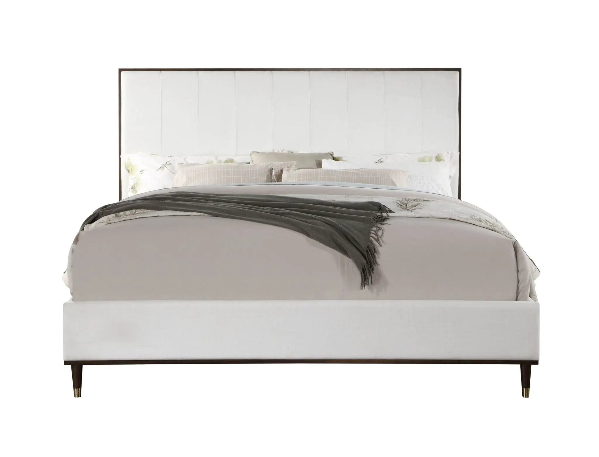 Carena Comfort Bed upholstered bed in light cream fabric with dark wood frame and tapered legs, neutral bedding on Tampa Home & Garden Store