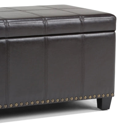 Amelia storage ottoman bench in dark brown leather with grid stitching and nailhead trim on Tampa Home & Garden Store