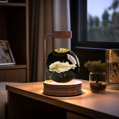 Crystal Ball Cosmic Dinosaur night light with wooden base USB-powered glow gold interior on Tampa Home & Garden Store