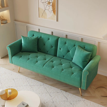 Luxurious turquoise tufted futon sofa bed with nailhead trim and matching pillows on Tampa Home & Garden Store
