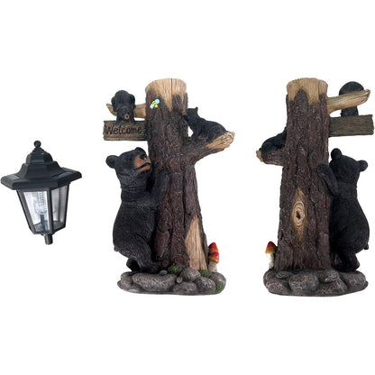 Black bear statues garden decor with Welcome sign and solar light, two bears on tree trunks on Tampa Home & Garden Store