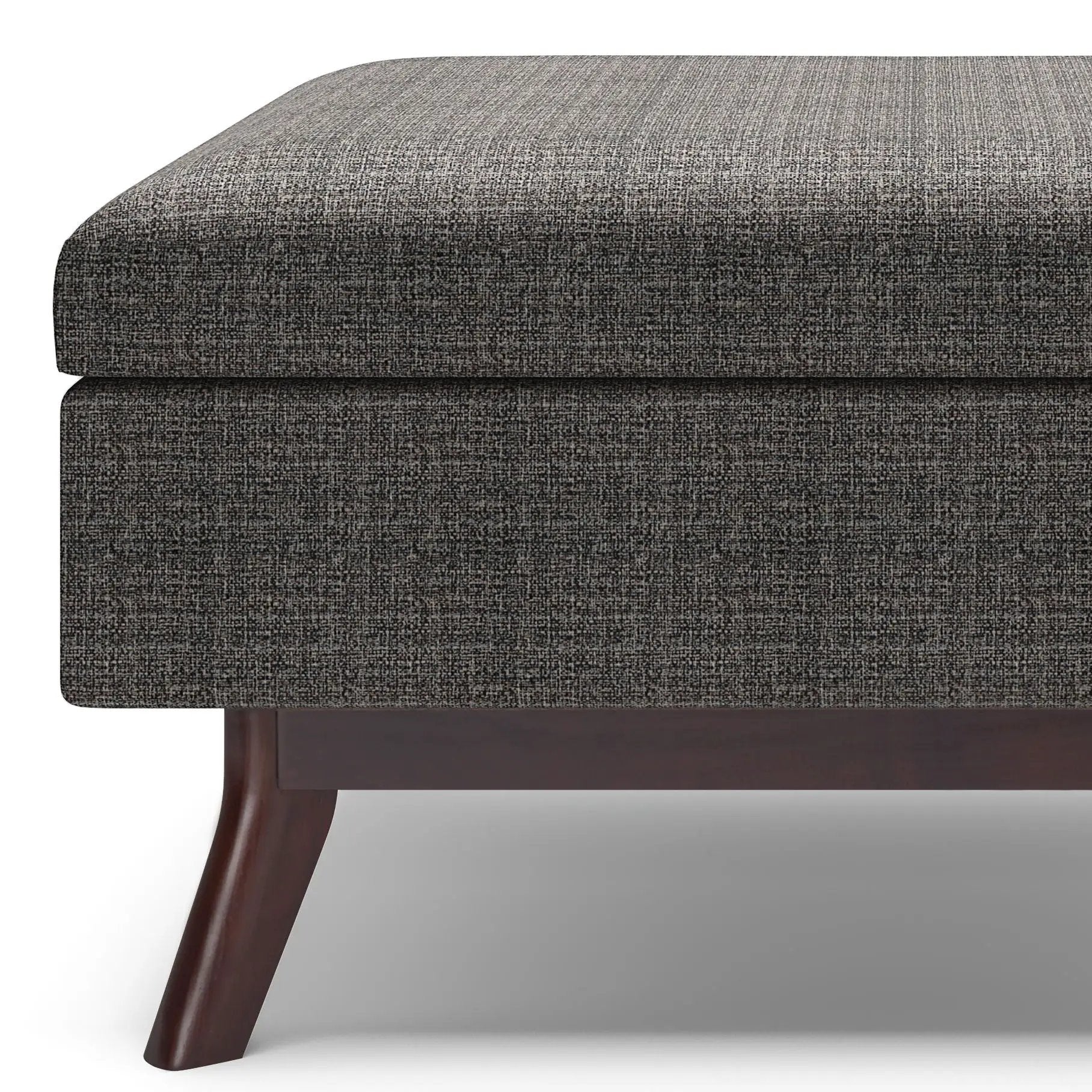 Owen Upholstered Rectangular Storage Ottoman in dark gray fabric with wood legs on Tampa Home & Garden Store