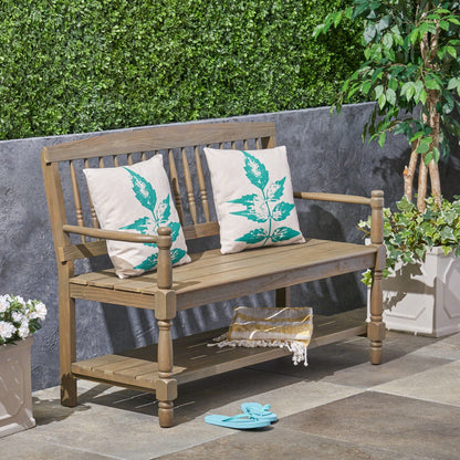 Imperial bench with built-in shelf in light brown acacia wood for outdoor use on Tampa Home & Garden Store