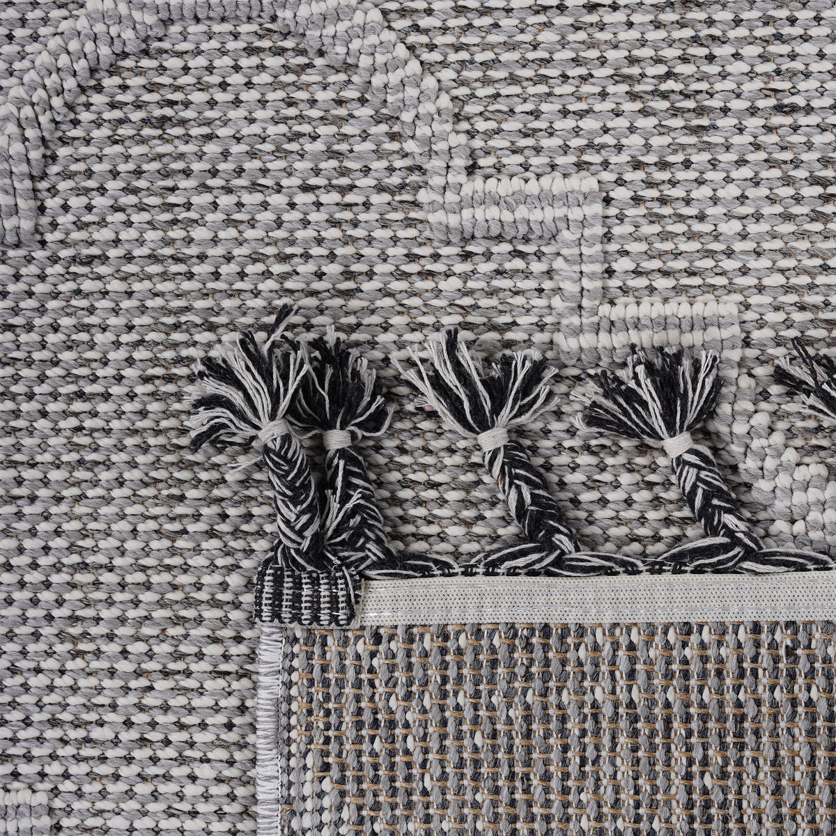 Guros Area Rug by HouseOfZazla, gray ivory stain resistant woven with fringe on Tampa Home & Garden Store