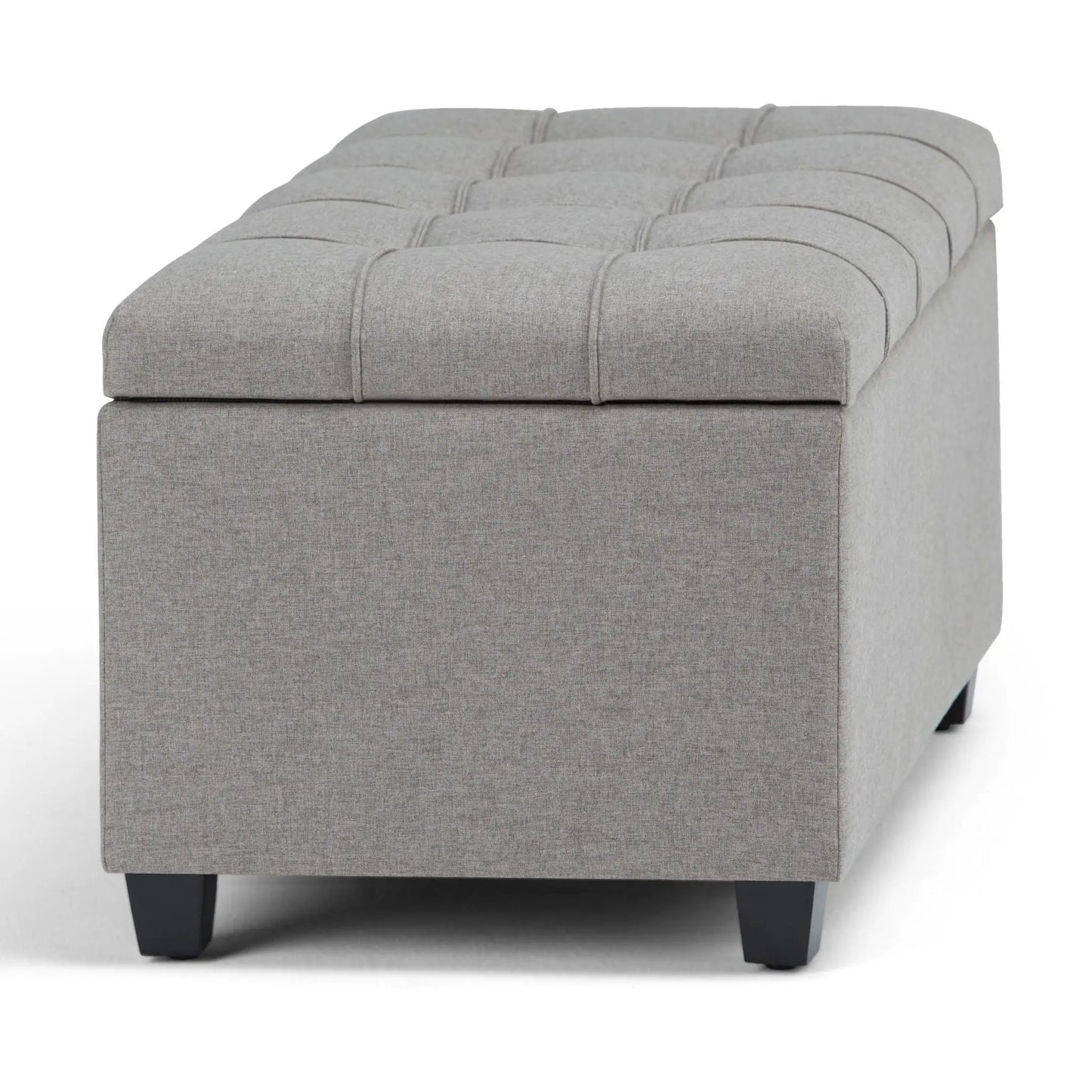 Sienna upholstered storage ottoman bench in grey fabric with tufted grid top and dark legs on Tampa Home & Garden Store