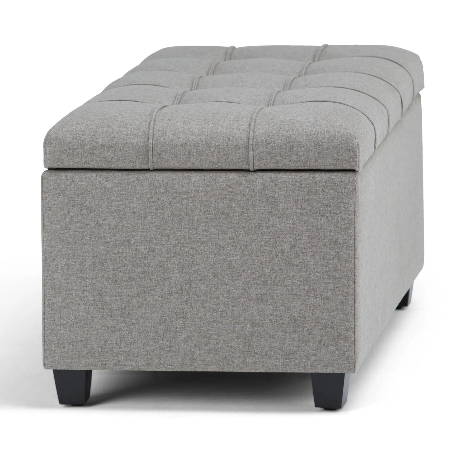 Sienna upholstered storage ottoman bench in grey fabric with tufted grid top and dark legs on Tampa Home & Garden Store