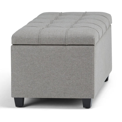 Sienna upholstered storage ottoman bench in grey fabric with tufted grid top and dark legs on Tampa Home & Garden Store