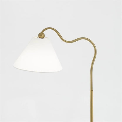 Ornate ring-base curved table lamp with gold finish and white triangle drum shade on Tampa Home & Garden Store