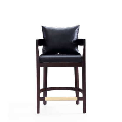 Mid-Century Counter Stool with black leather upholstery, dark wood frame and brass footrest on Tampa Home & Garden Store