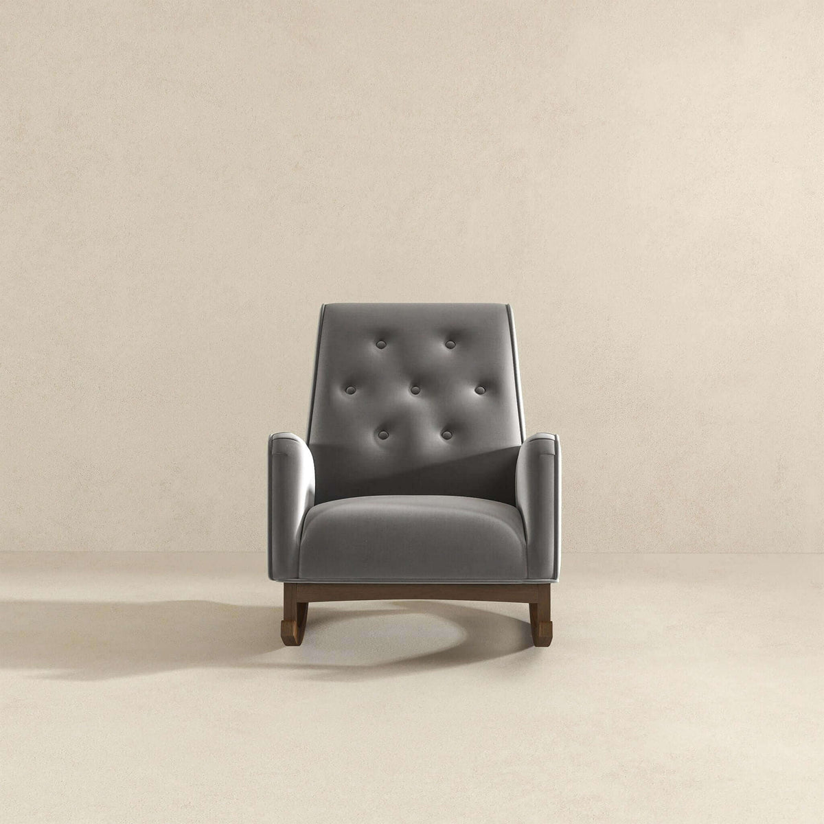 Demetrius solid wood rocking chair in dark gray upholstery with tufted back and wooden rockers on Tampa Home & Garden Store