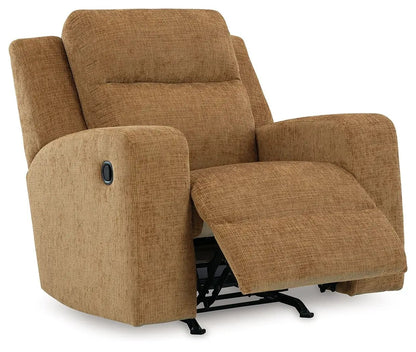 Kanlow Rocker Recliner tan textured fabric with recline footrest and black metal base on Tampa Home & Garden Store