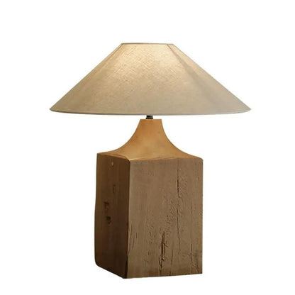 Table lamp with solid wood block base and beige fabric shade on Tampa Home & Garden Store