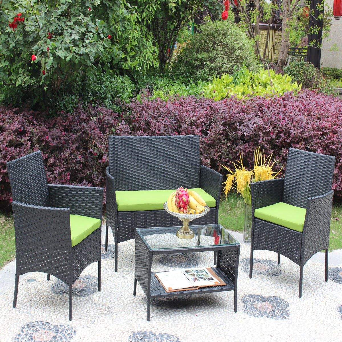 4 pc rattan patio furniture set with black wicker and lime cushions for outdoor seating on Tampa Home & Garden Store