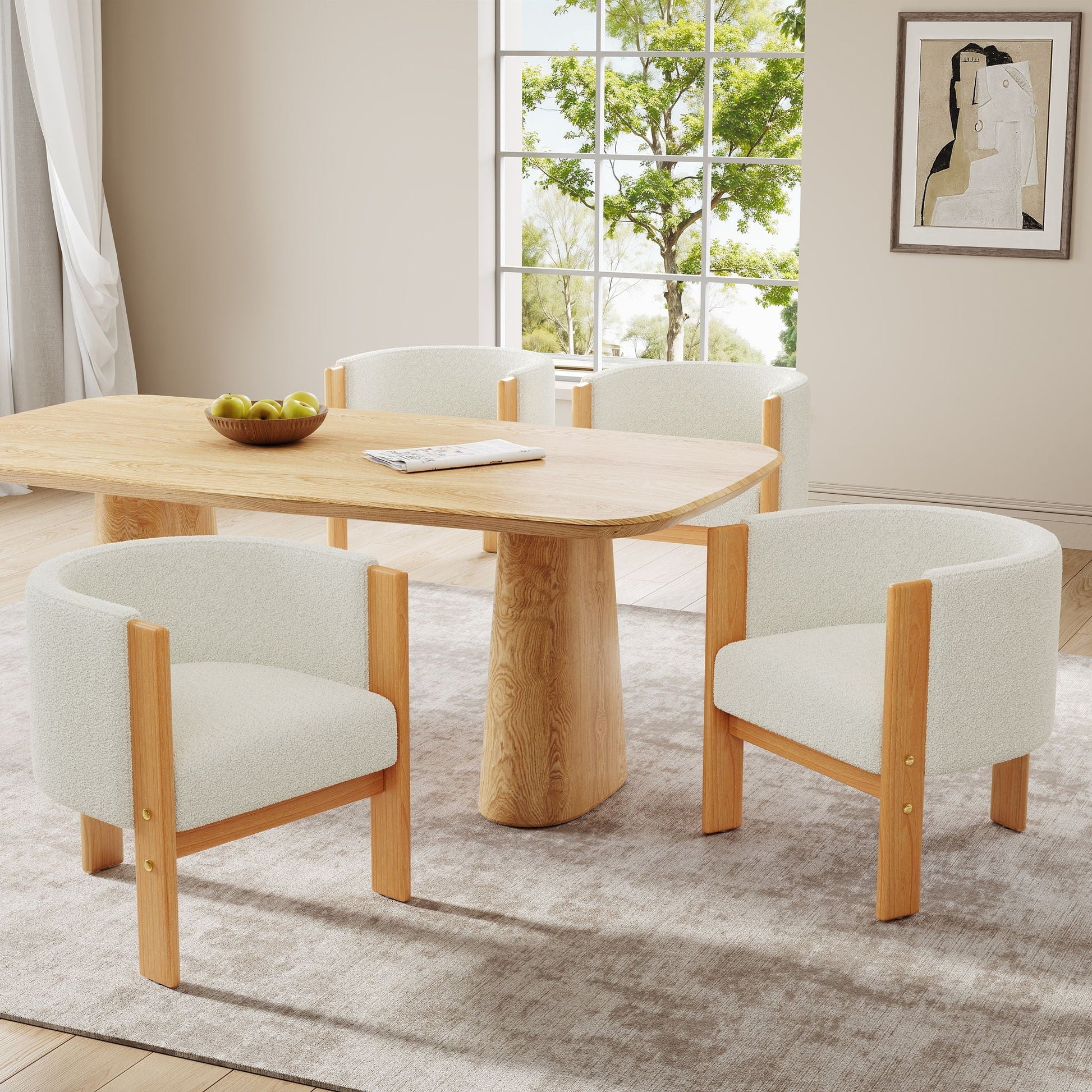 HouseOfZazla dining chairs in cream upholstery with natural wood legs around a round table on Tampa Home & Garden Store