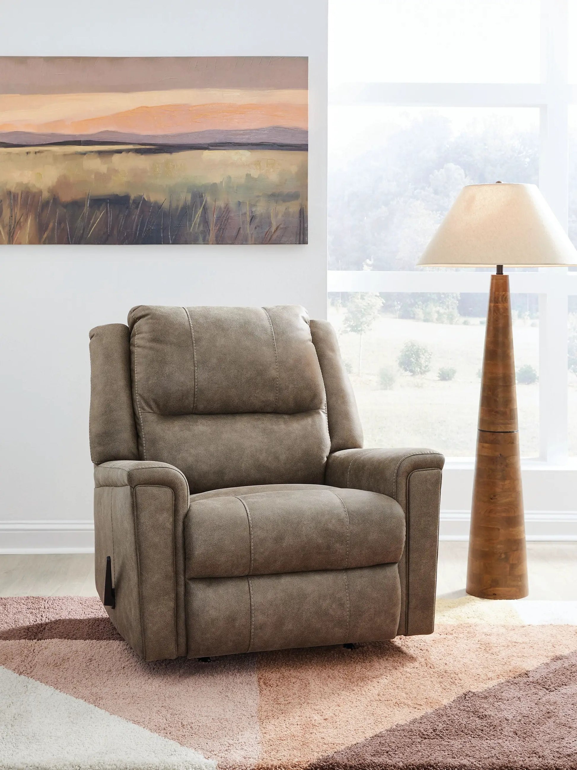 Lixtowel Rocker Recliner in taupe fabric with plush cushions and padded arms on Tampa Home & Garden Store