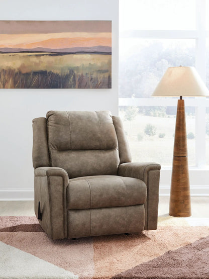 Lixtowel Rocker Recliner in taupe fabric with plush cushions and padded arms on Tampa Home & Garden Store