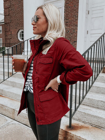 Stevvex red pocketed long-sleeve zip-up jacket lightweight Coats & Jackets worn by woman on Tampa Home & Garden Store