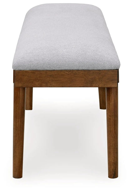 Lyncott large upholstered dining bench gray fabric with brown wood legs on Tampa Home & Garden Store
