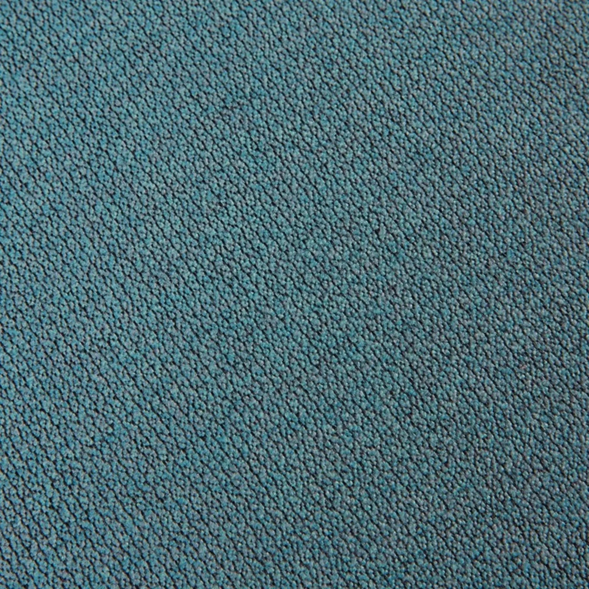Blue textured carpet close-up with teal tones on Tampa Home & Garden Store