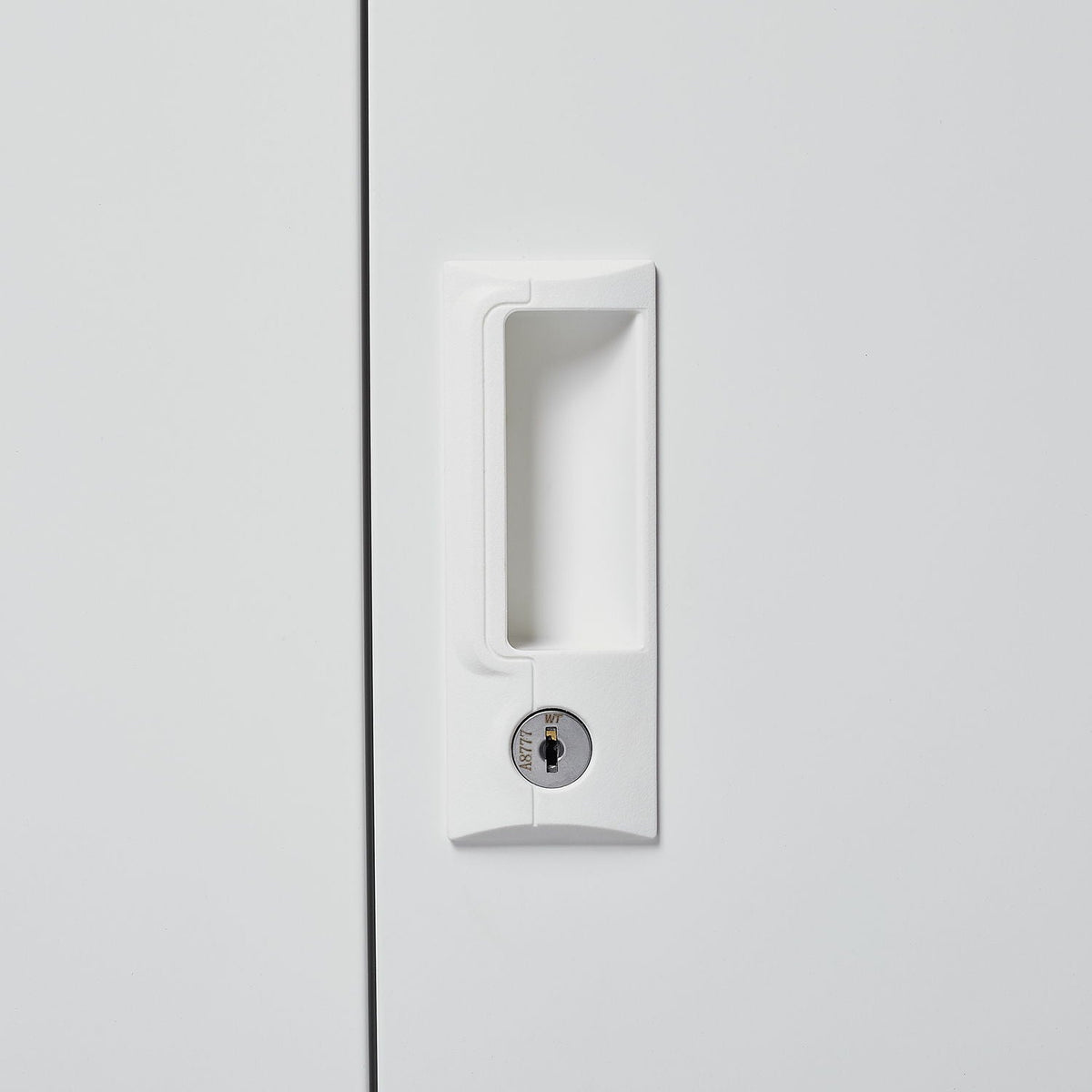White metal filing cabinet with lockable doors and recessed handle on Tampa Home & Garden Store