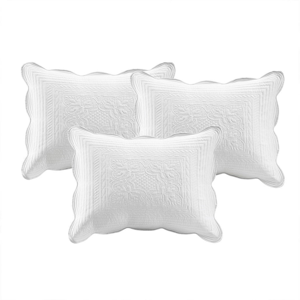 3 white scalloped-edge quilted pillows from HouseOfZazla bedding set on Tampa Home & Garden Store