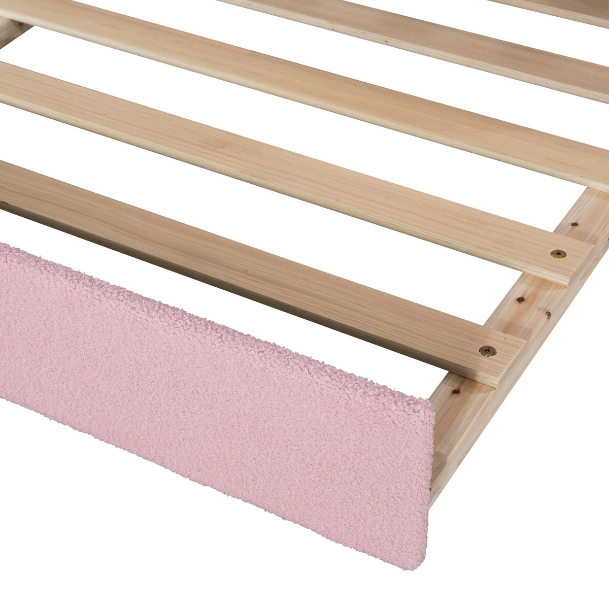 Light pine wooden slatted trundle bed frame with pink shag rug on Tampa Home & Garden Store